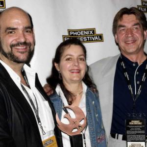 Ricardo Méndez Matta and Poli Marichal receive the Best Director award from Slobodan Popovic at the 2006 Phoenix Film Festival.