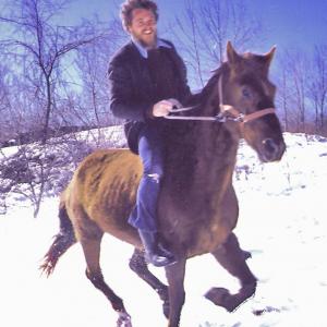 William Waterway riding Bishop on artist Eric Sloanes Warren CT estate  where William and his two horses from the 7500 RIDE FOR NATURE adventure enjoyed a winter sojoourn