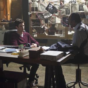 Still of Jesse L Martin and Grant Gustin in The Flash 2014