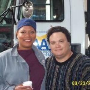 Queen Latifah and Adrian Martinez on the set of TAXI