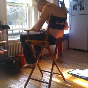 Christopher Martini preparing for acting and directing a scene in 