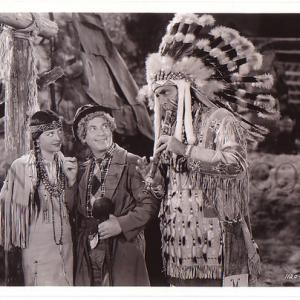 Still of Mitchell Lewis Harpo Marx and Joan Woodbury in Go West 1940