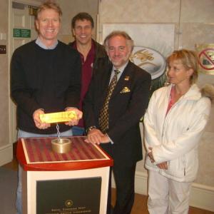 During a private tour of the Royal Canadian Mint, William holding a gold bullion with fellow cast members Gary & Gabrielle during the filming of 
