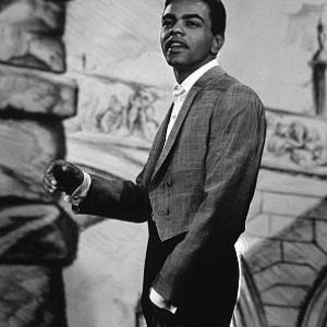 Johnny Mathis, circa 1959. Vintage silver gelatin, 16x13.75, mounted on 20x16 board, gold-toned, embossed. $900 © 1978 Wallace Seawell MPTV