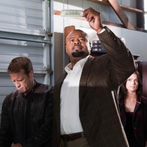 Still of Chi McBride and Mark Valley in Human Target (2010)