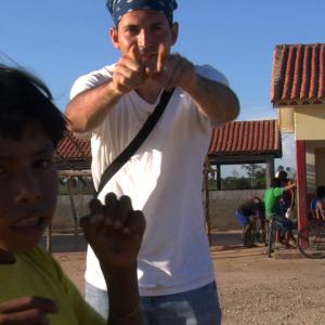 Tarek McCarthy with the Xavante Tribe while directing a documentary in Northern Brazil
