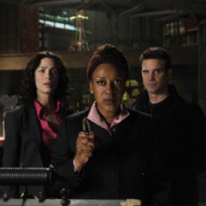 Still of CCH Pounder Eddie McClintock and Joanne Kelly in Warehouse 13 2009