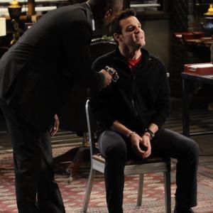 Still of Eddie McClintock and Charles Malik Whitfield in Warehouse 13 2009