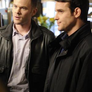 Still of Aaron Ashmore and Eddie McClintock in Warehouse 13 2009