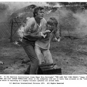Still of Doug McClure and Susan Penhaligon in The Land That Time Forgot 1975