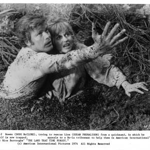 Still of Doug McClure and Susan Penhaligon in The Land That Time Forgot 1975