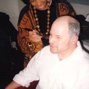 Cat'Ania McCoy-Howze with Jason Alexander for Love and Action in Chicago. She applies his makeup as a Makeup Department Head