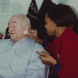 CatAnia McCoyHowze with Edward Asner in Love and Action in Chicago She applies his makeup as a Makeup Department Head