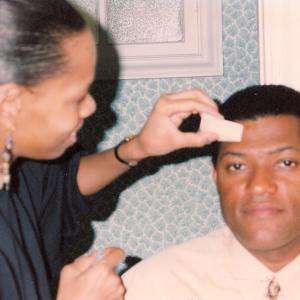 Cat'Ania McCoy-Howze, Makeup Arist applying makeup on actor Laurence Fishburne for a What's Love Got to Do With It Promo.