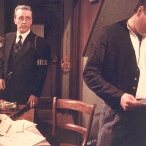 Chris Sullivan (I) (left) with Lloyd McGuire in Nine Days in May (1984) (TV)|