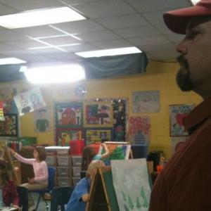 Director at art class on Lake Effects set