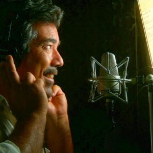 Jeff McNeal at work voicing trailers and promos in his Southern California studio