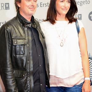Director Friedemann Fromm and actress Claudia Mehnert Nicole Henning attend the premiere of TV mini series Weissensee 3rd season