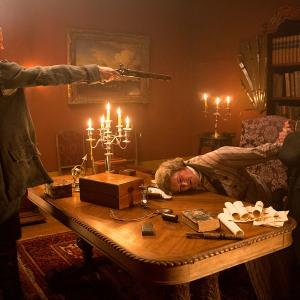 A scene from Black Sails season 1 episode 1 with Tom Hopper, Sean Cameron Michael and Toby Stephens.