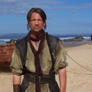 As Nolan Moore on the set of Crusoe (NBC)