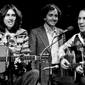 George Harrison Lorne Michaels and Paul Simon on Saturday Night Live 11201976