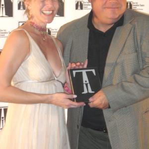 Kevin Chamberlain presenting the New York Innovative Theatre award to Elyse Mirto for Outstanding Actress in a Lead role