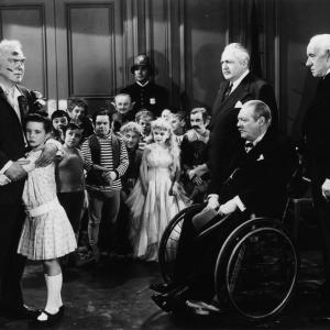Lionel Barrymore Billy Barty Edward Arnold Billy Curtis Bobby Driscoll Nita Krebs Thomas Mitchell Margaret OBrien and Lewis Stone in Three Wise Fools 1946
