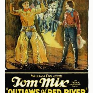 Marjorie Daw and Tom Mix in Outlaws of Red River 1927