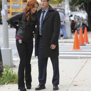 Still of Poppy Montgomery and Dylan Walsh in Unforgettable (2011)