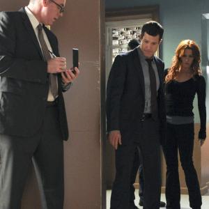 Still of Poppy Montgomery Dylan Walsh and Mike Costello in Unforgettable 2011