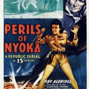 Kay Aldridge Clayton Moore Charles Middleton and Emil Van Horn in Perils of Nyoka 1942