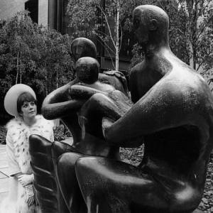 Natalie Wood viewing Henry Moores sculpture Family Group 1966 during a break of filming Penelope