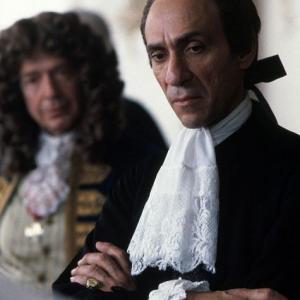 Salieri (F. MURRAY ABRAHAM) with Baron Van Swieten (JONATHAN MOORE, in background)