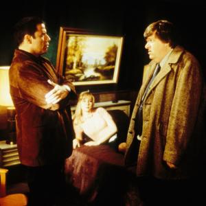 Still of John Travolta, Lisa Kudrow and Michael Moore in Lucky Numbers (2000)