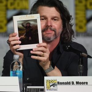 Ronald D Moore at event of Outlander 2014