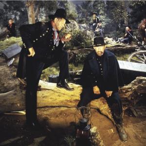 Still of John Wayne and Harry Morgan in How the West Was Won (1962)