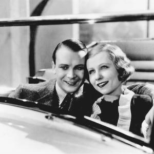 Still of John Mills and Grete Mosheim in Car of Dreams (1935)