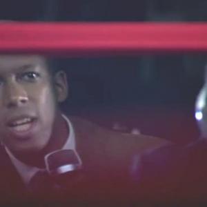 Screen shot from the feature film Phantom Punch  As ringside announcer Trent Mays