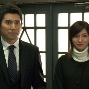 Still of Ryôko Hirosue and Masahiro Motoki in Okuribito (2008)