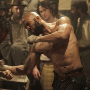Still of Anson Mount and Common in Hell on Wheels 2011