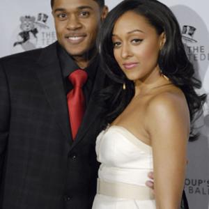 Pooch Hall and Tia Mowry-Hardrict