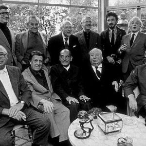 Directors Group Nov 1972 George Cukor Hosts a party for Luis Bunuel Back Row from left Robert Mulligan William Wyler George Cukor Robert Wise JeanClaude Carriere and Serge Silverman Front Row from left Billy Wilder George Stevens Luis Bunuel Alfred Hitchcock and Rouben Mamoulin
