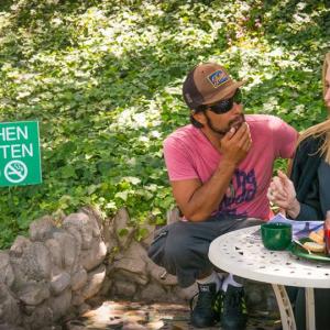 Alex talks with actress Tonya Kinzinger on set of 'Griot's Lament'