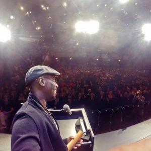 Ntare Guma Mbaho Mwine takes selfie while accepting award for his short film KUHANI at the Internationale Kurzfilmtage Winterthur in Switzerland 2014