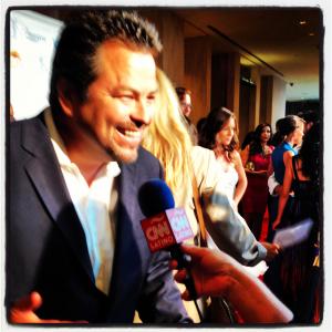 Rick Najera on red carpet at Imagen Awards with CNN Latino