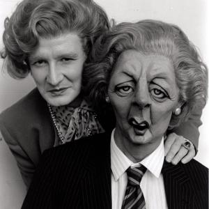 Steve Nallon, in character as Margaret Thatcher with the Thatcher SPITTING IMAGE puppet.