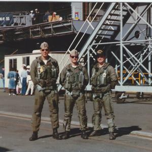 Adam ( center ) as f-15 pilot