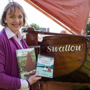 Sophie Neville with her memoir on 'The Making of Swallows & Amazons' and StudioCanal's 40th anniversary release of the DVVD