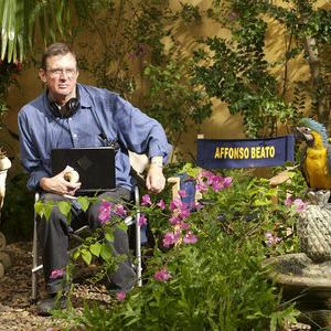 Director Mike Newell and Pacho the parrot