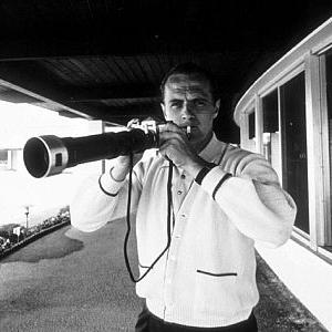 Bob Newhart with Sid Averys Nikon camera 1961